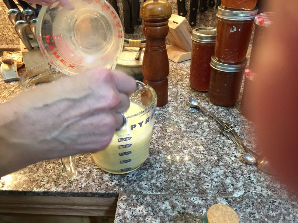 Whisk the eggs, milk and salt and pepper in the measuring cup.