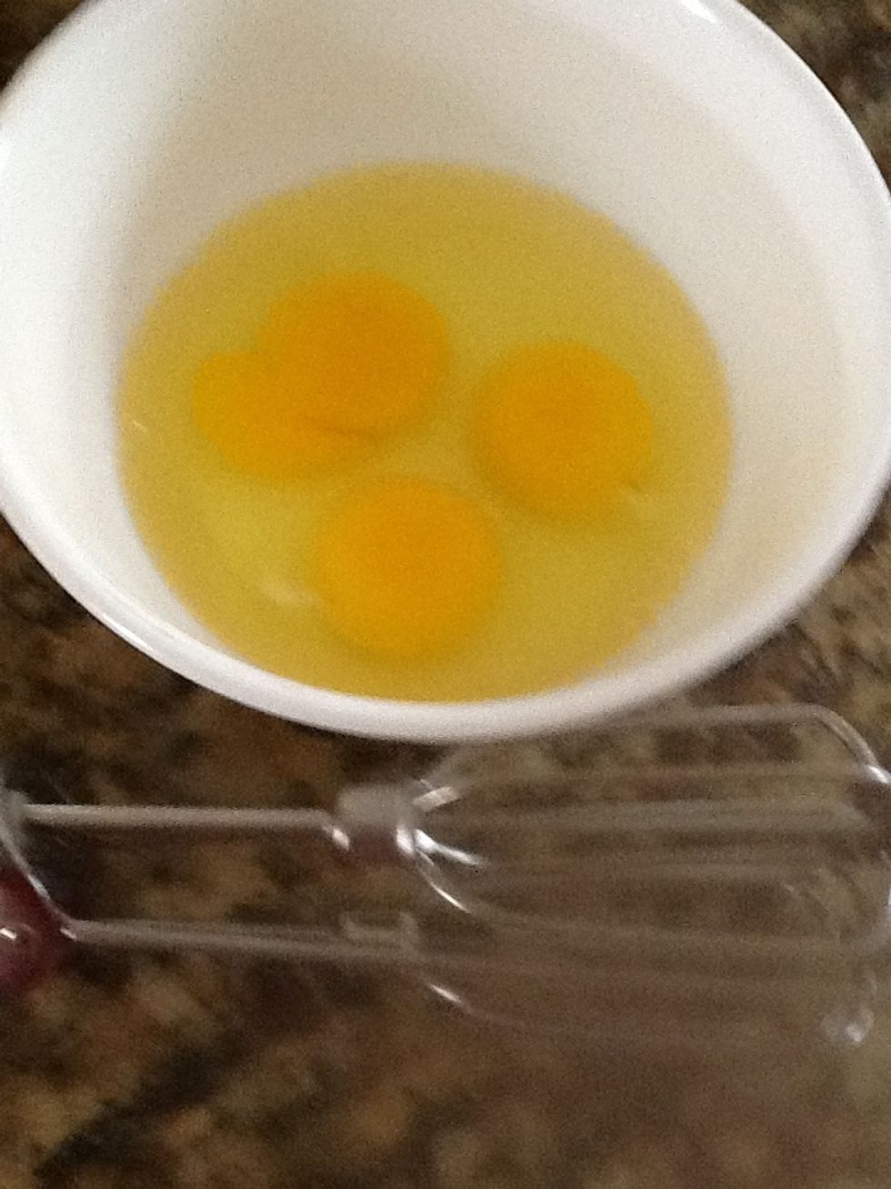 Whisk the eggs really well. The more you whisk, the fluffier the quiche