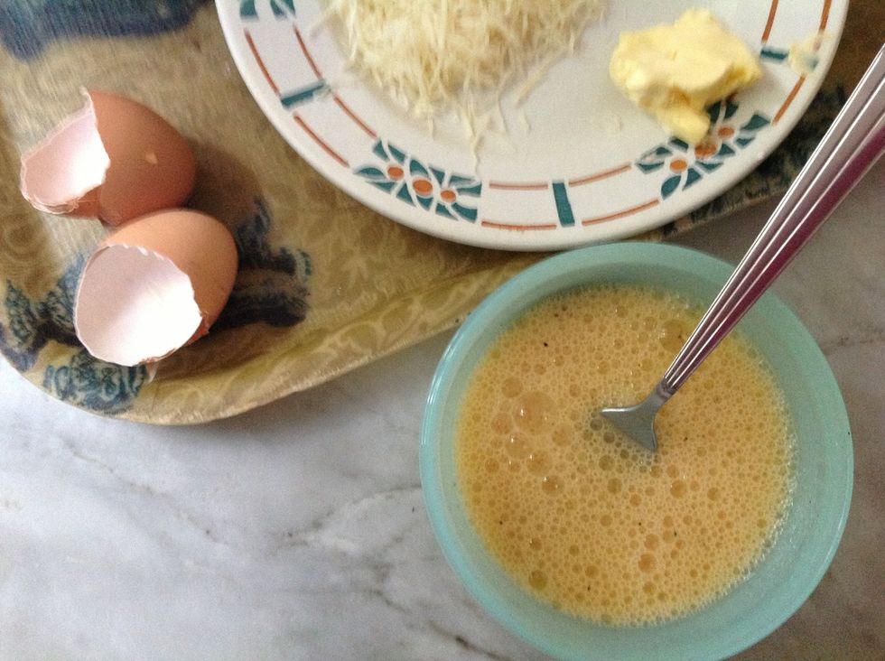 Whisk the eggs with salt and pepper as if making an omelette.