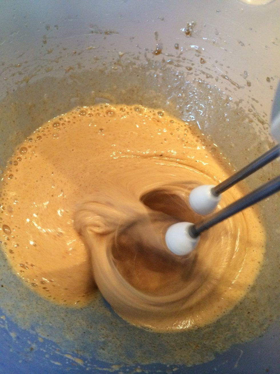 Whisk the eggs with the brown and white sugar.