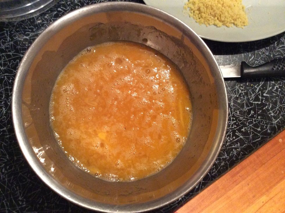 Whisk the sugar and eggs together in a heatproof bowl