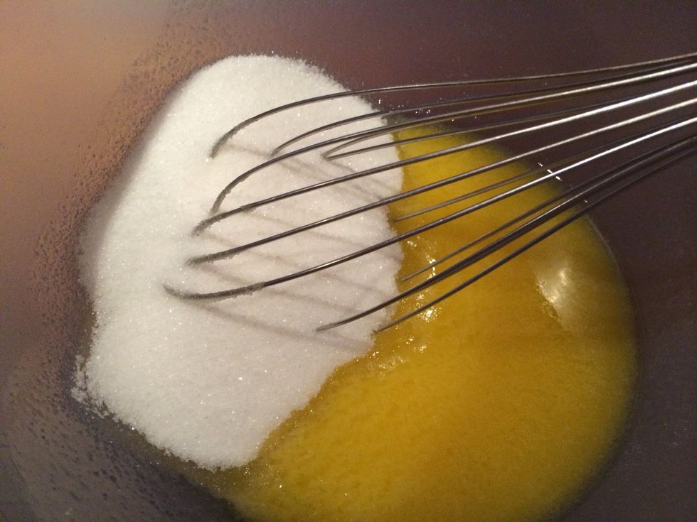 Whisk the sugar and the melted butter.