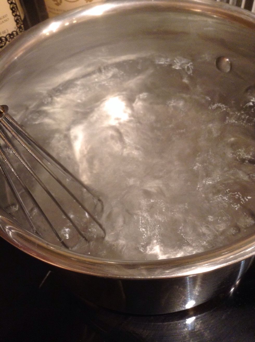 Whisk the water until it forms a whirlpool. The ensures that the egg will stay in the middle of the pot.