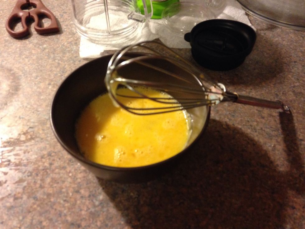 Whisk three eggs to make egg wash