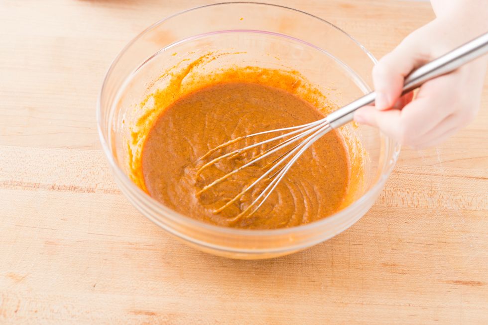 Whisk to combine the ingredients.
