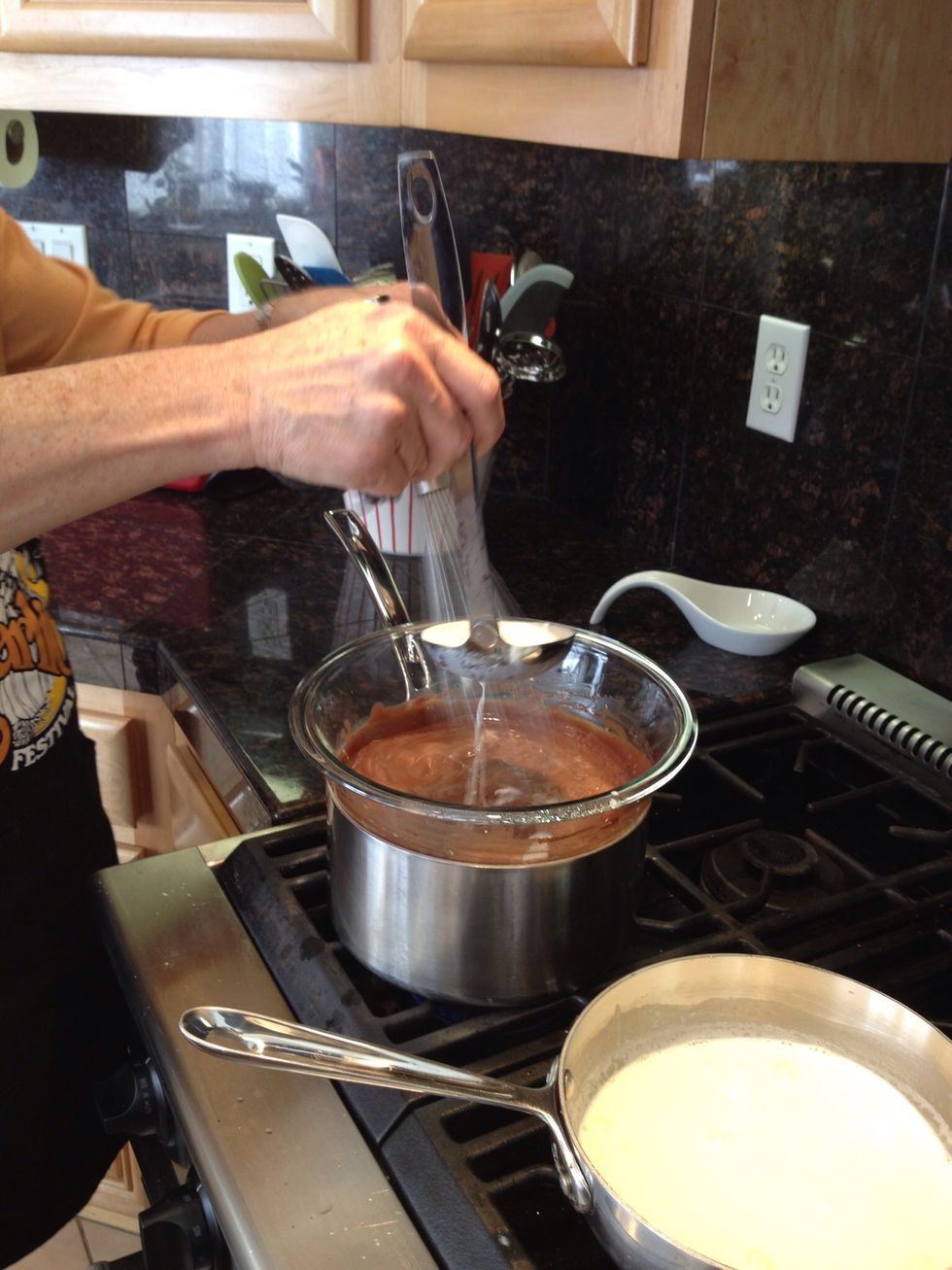 Whisk to combine the ingredients.