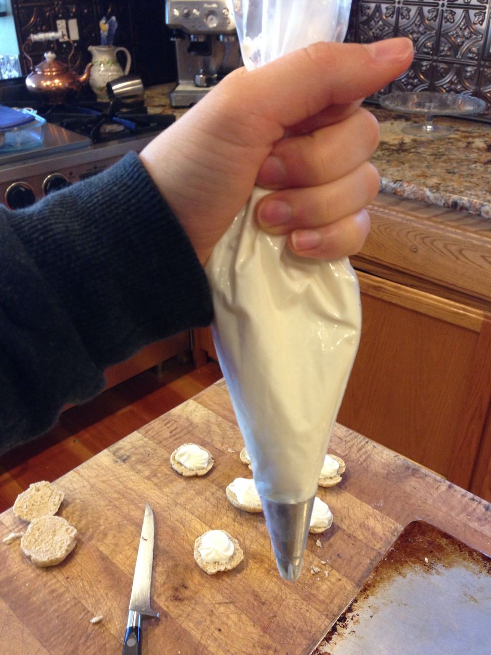 Whisk together a cup of Greek yogurt, 2 tbsp agave, and 1 tsp vanilla extract. Throw it into a piping bag :)