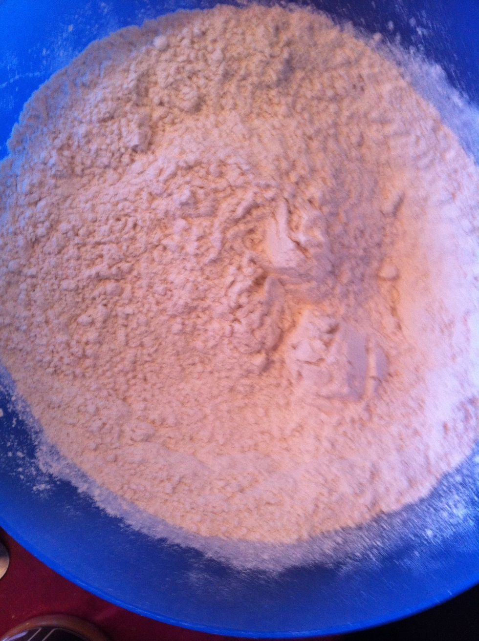 Whisk together and add milk mixture stir together and then put on a floured surface and knead.