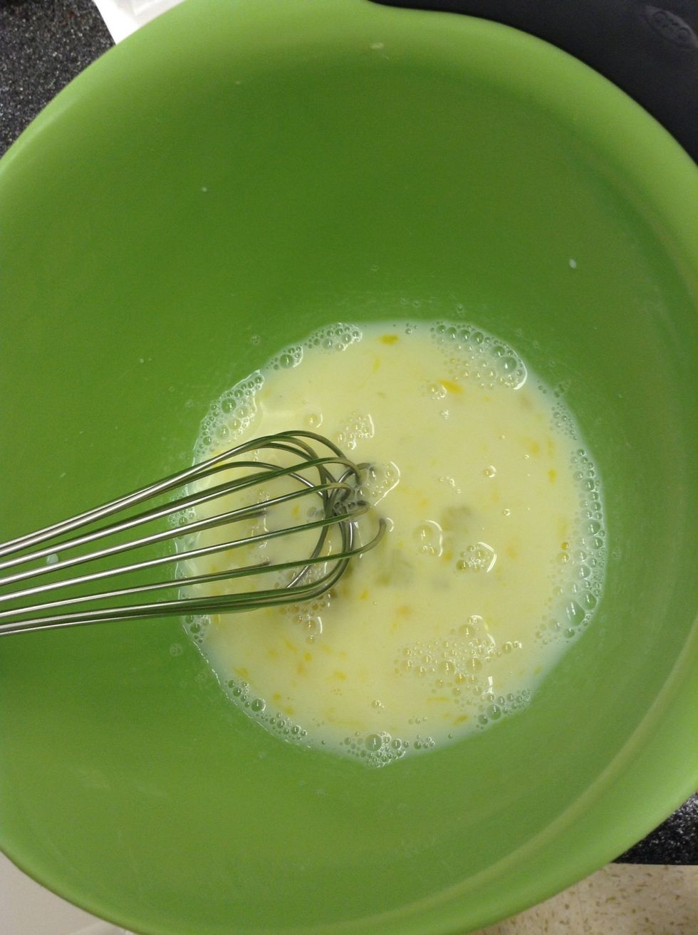 Whisk together egg and milk