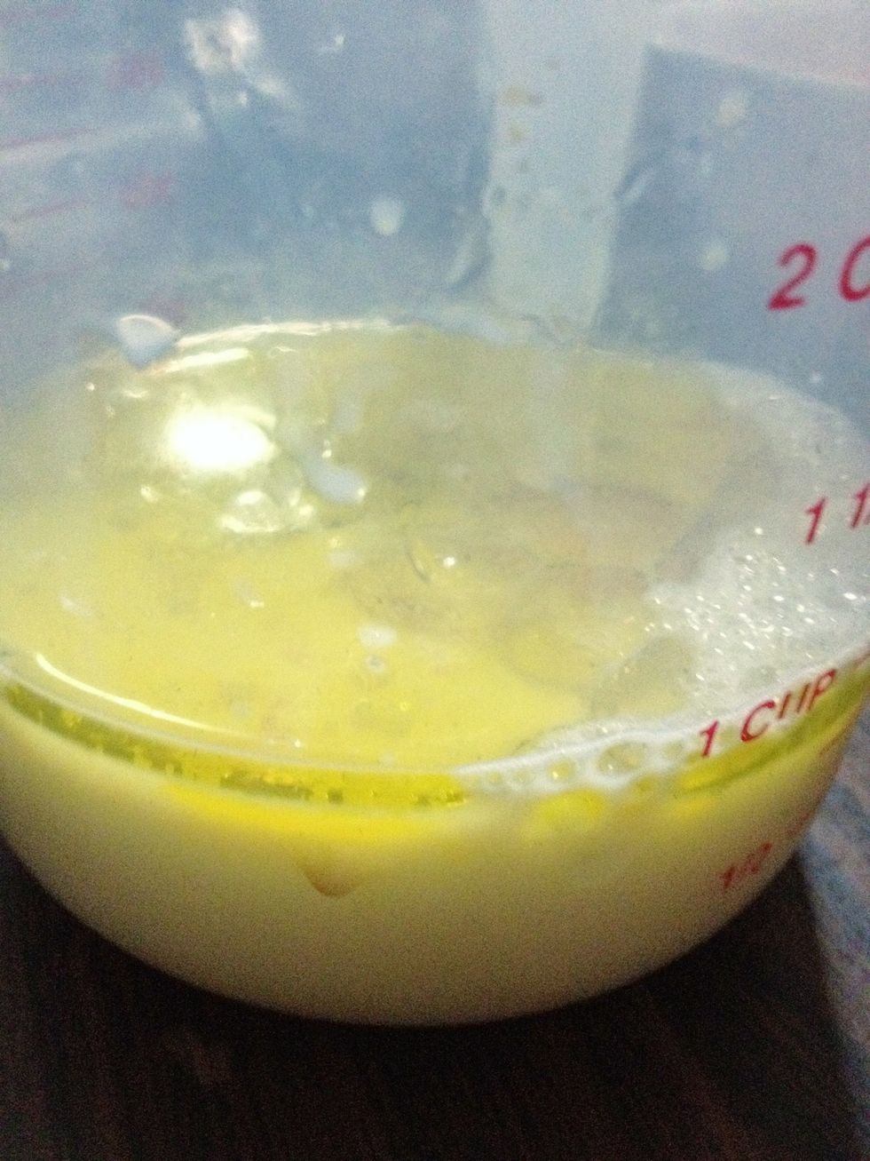 Whisk together egg, olive oil, milk and vanilla essence (oil/egg mixture).