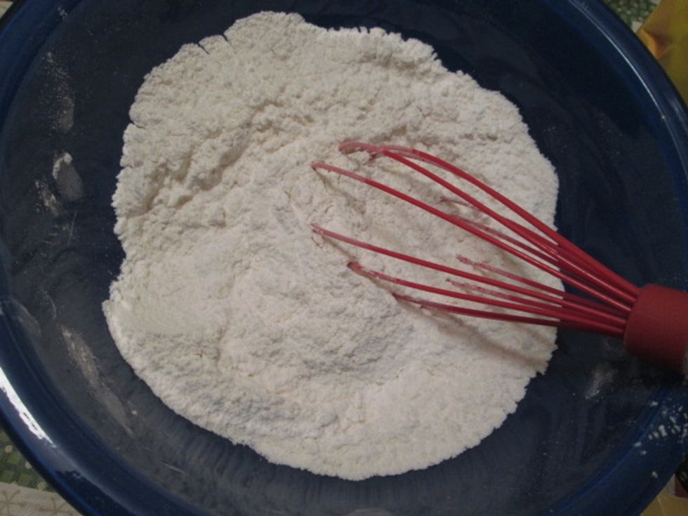 Whisk together flour and baking soda. Set aside.