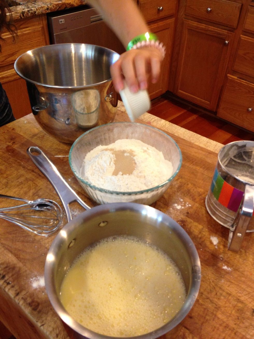 Whisk together flour and yeast.