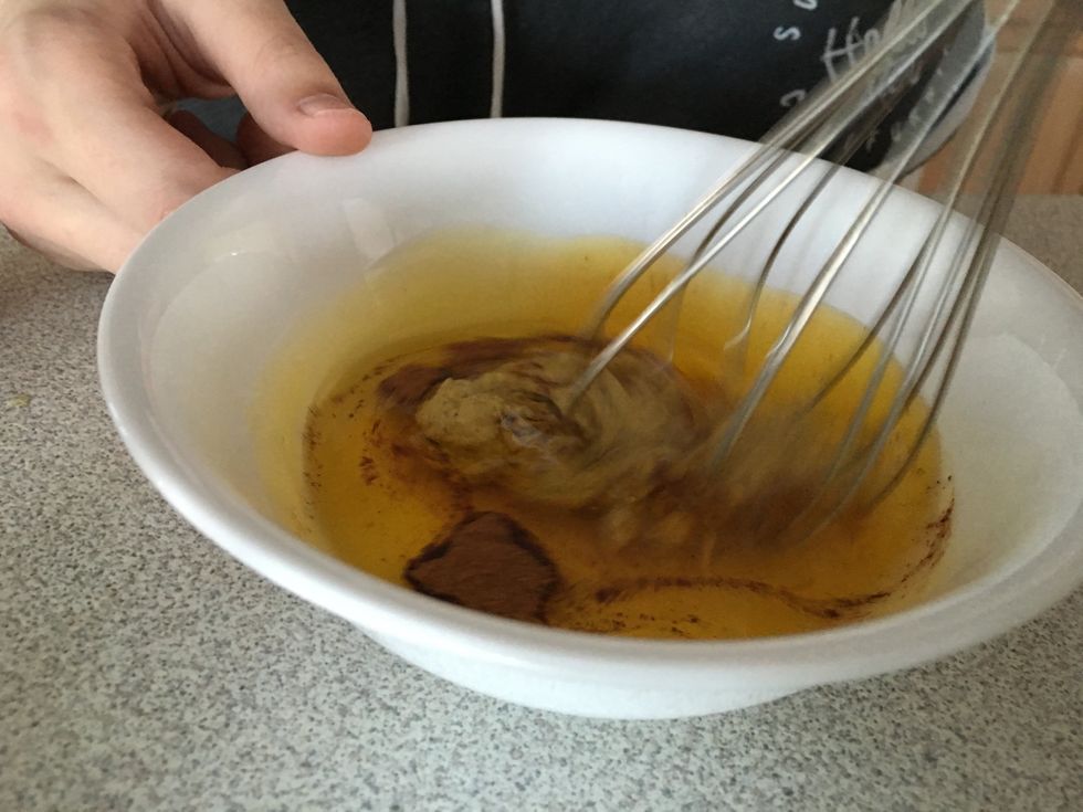 Whisk together olive oil, dijon mustard, maple syrup and cinnamon.