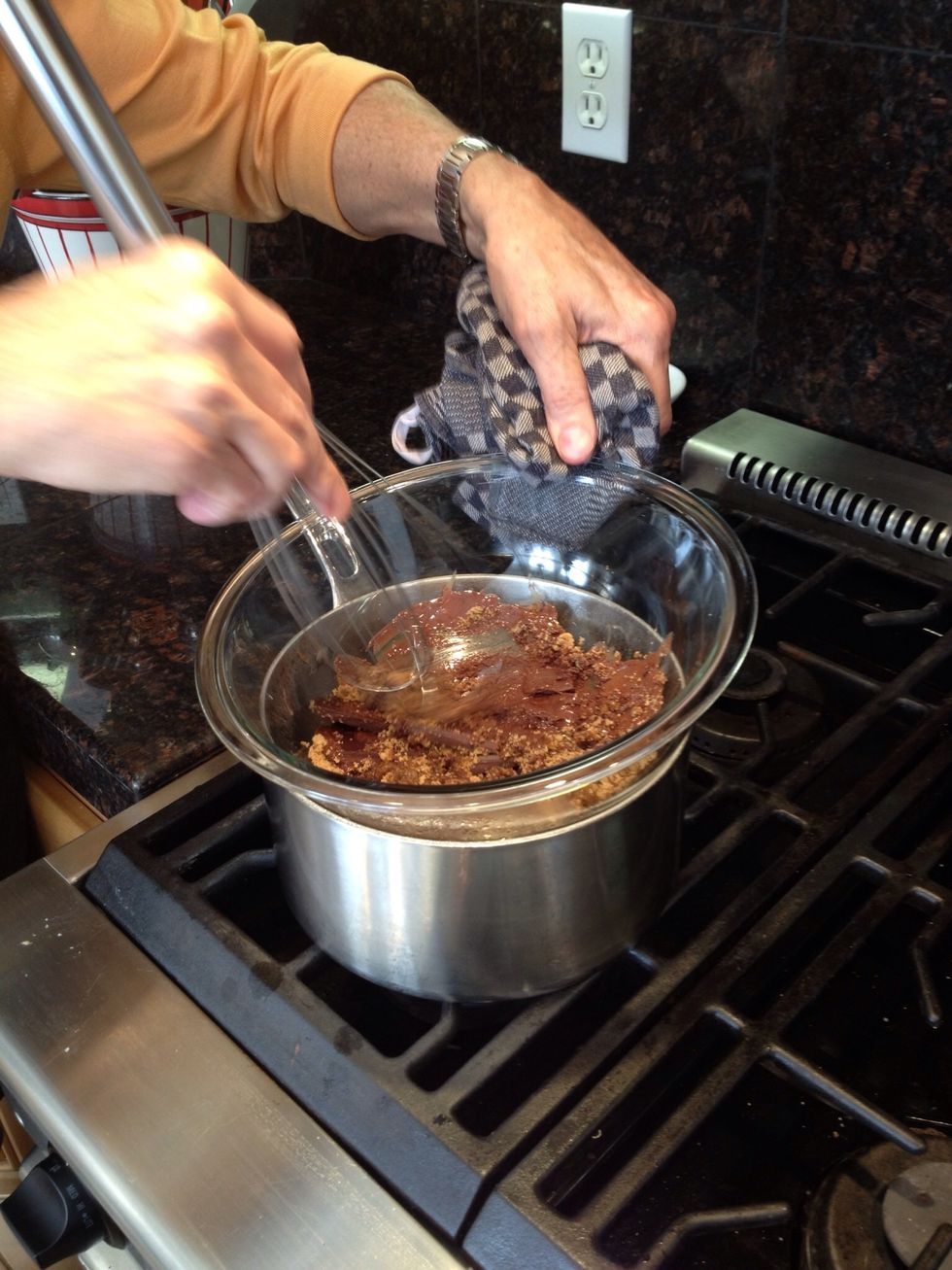Whisk together the chocolate and brown sugar until they are smooth and the chocolate is melted.