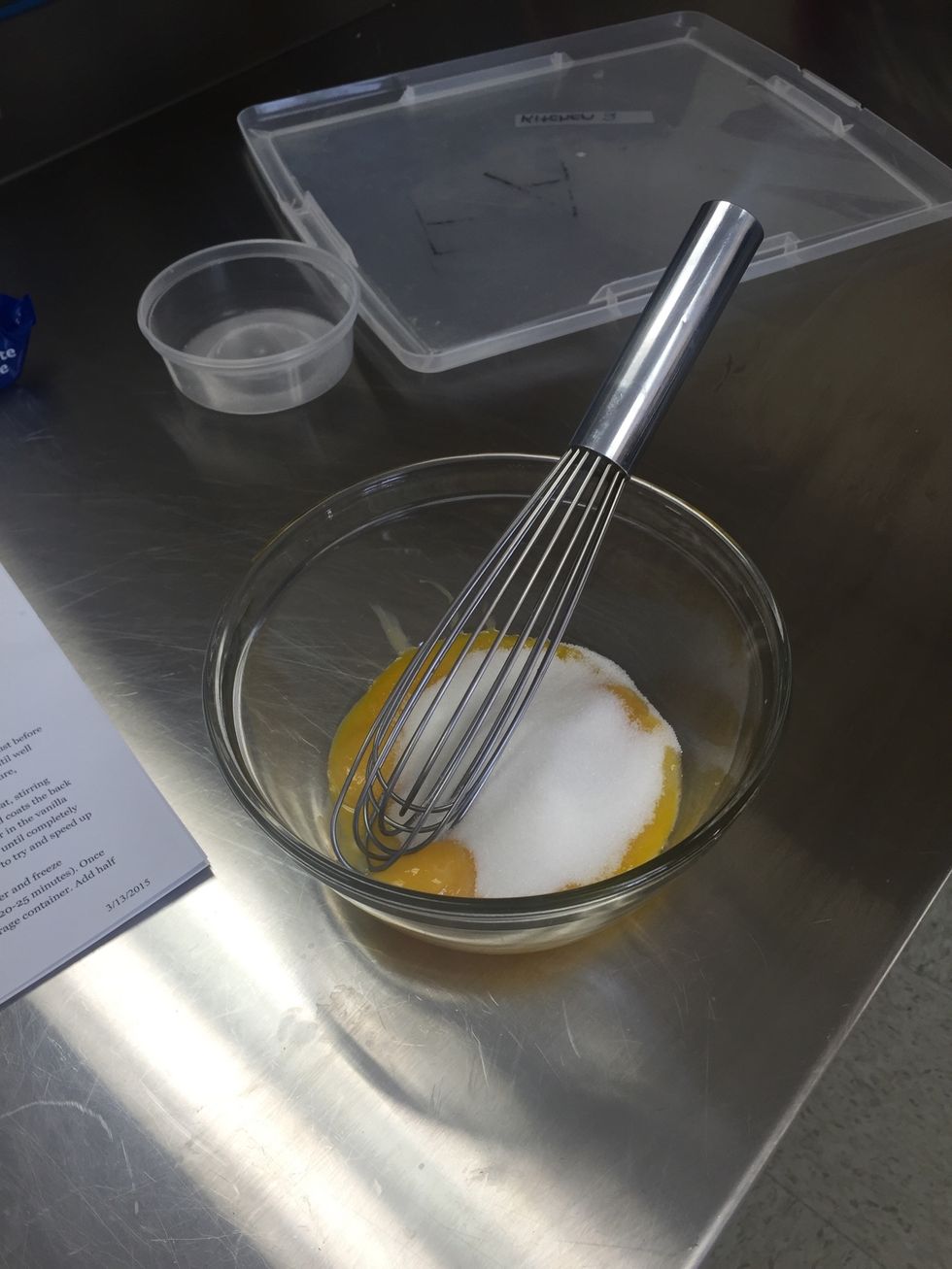 Whisk together the egg yolks and sugar until well combined.