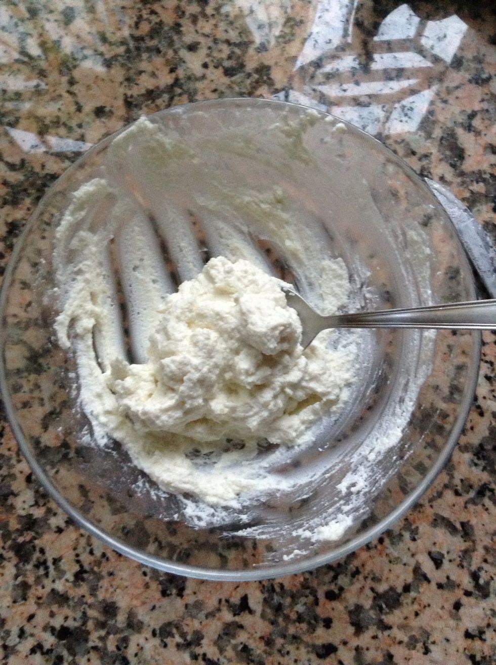 Whisk together your ricotta cheese and your sugar.