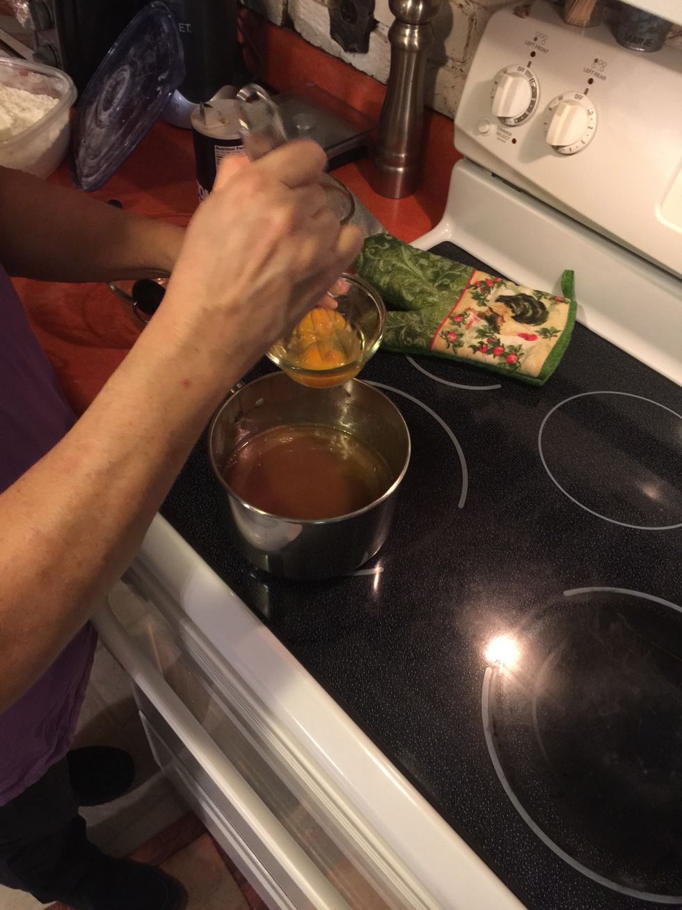 Whisk up two eggs and pour in pan