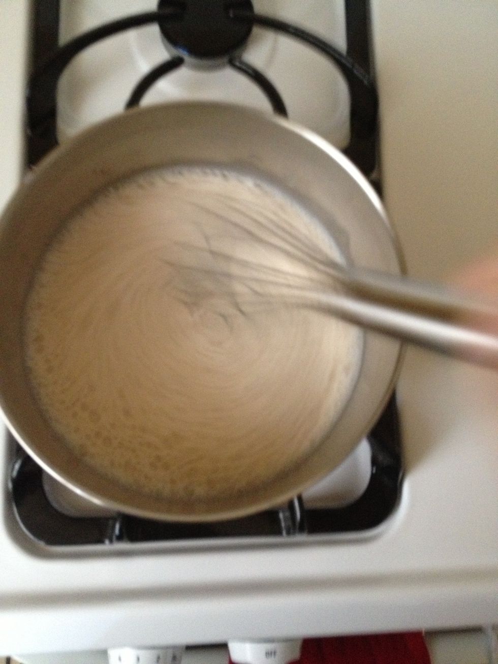 Whisk vigorously until milk is hot and foamy.