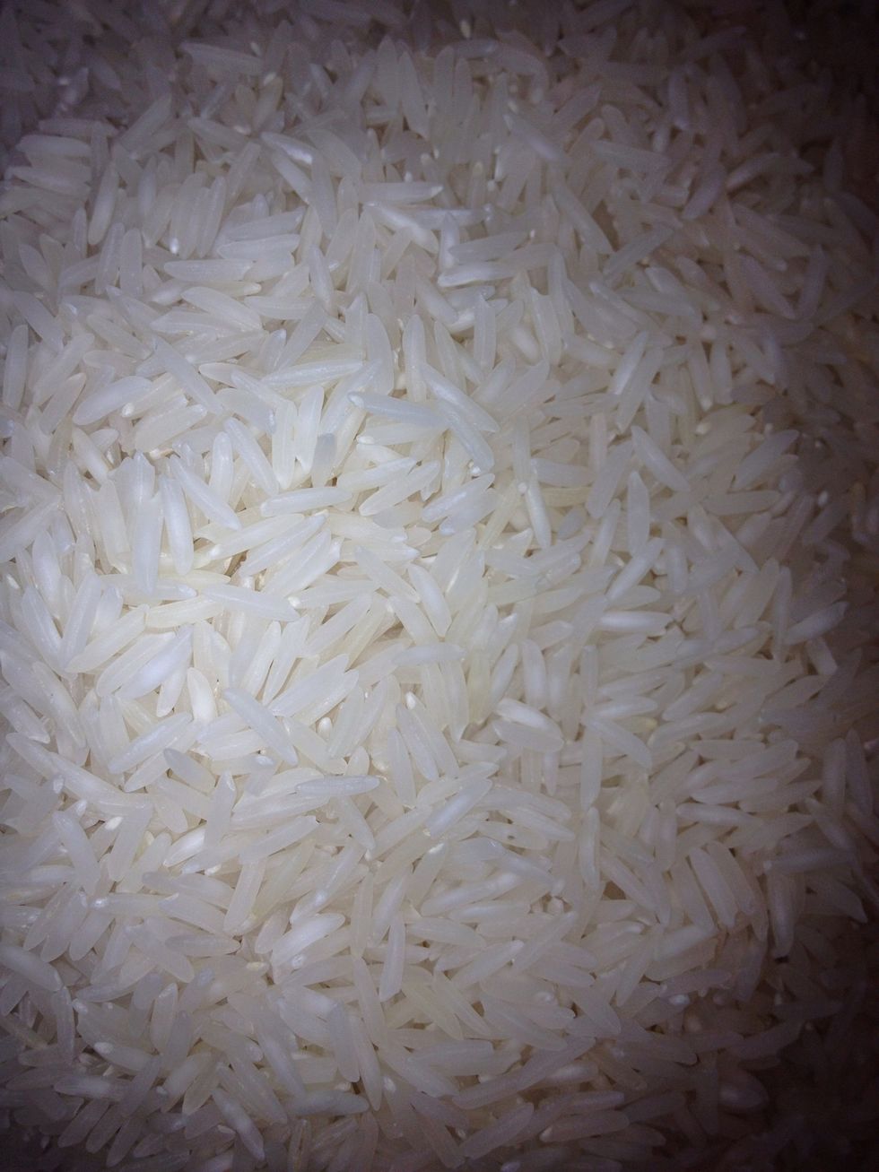 White Basmati rice -known for its strong smell from a high content of 2-acetyl-1-pyrroline (think baked bread)  and long grains which separate easily and fluff nicely after cooking.
