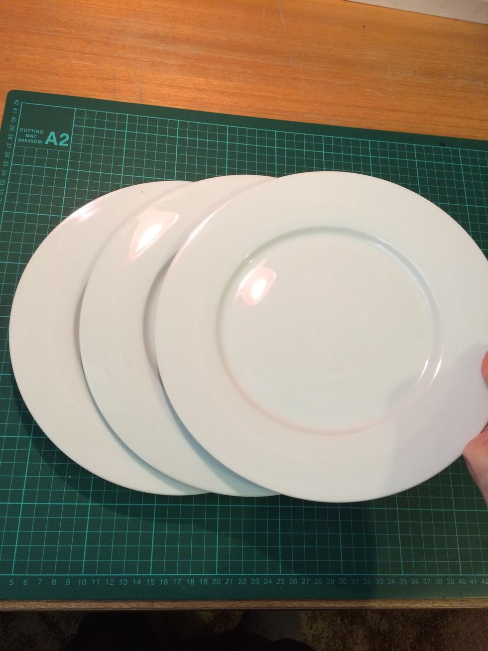 White Porcelaine plates I purchased from Woolworths.  This idea came from Pinterest and I love it. A plate that continually circulates from home to home Giving people a hand (via home cooked meals)