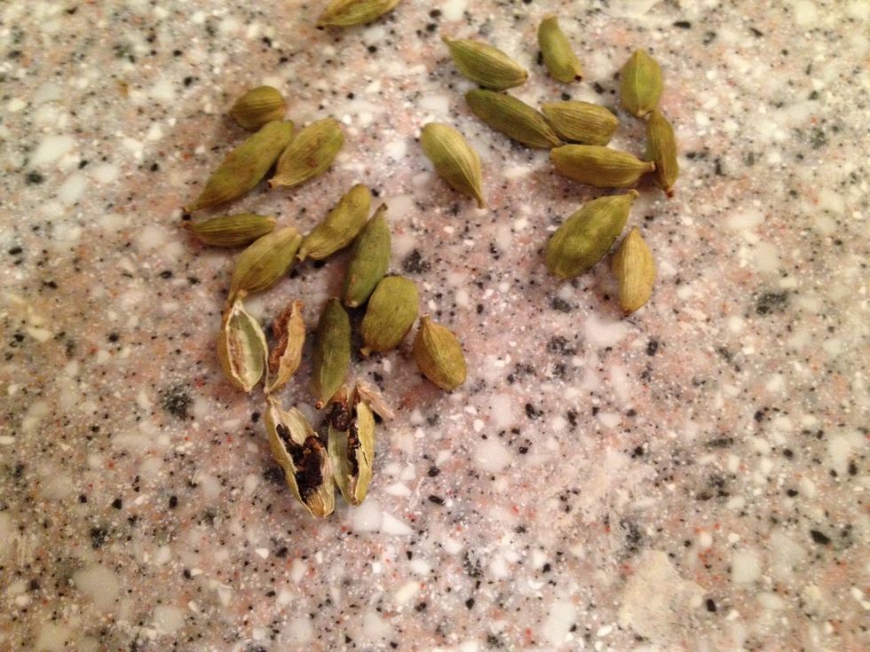 Whole cardamom. The black seeds are what you use. Crush them in your mortar or use a spice mill. Freshly grounded spices have much more flavour. Grounded spices will loose 80% flavour in 1 week.