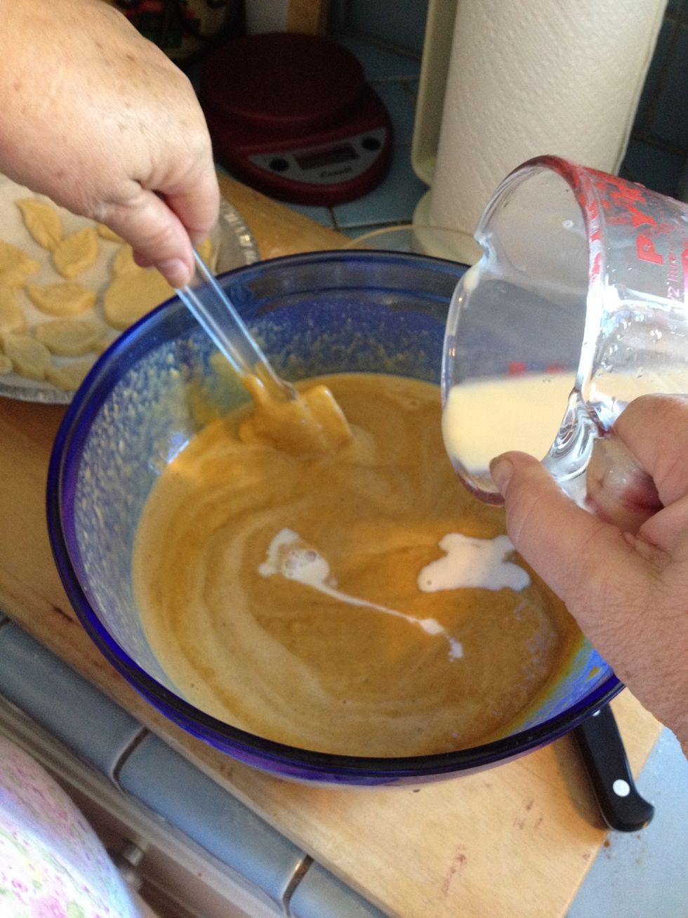 Whoops! I forget to add the evaporated milk while it was in the food processor. So I'm doing it now in this bowl.