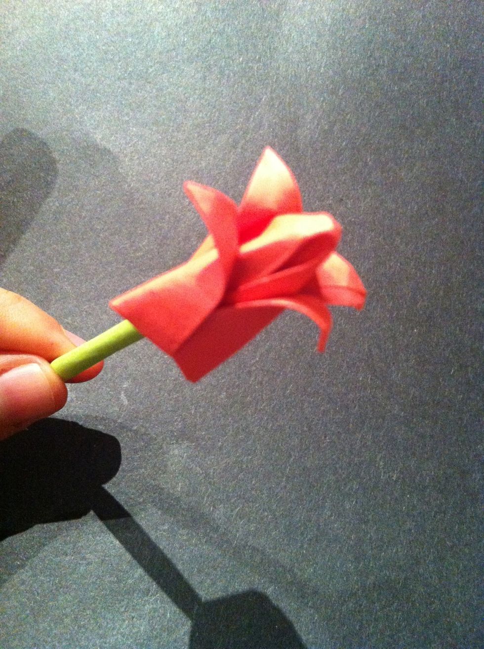 Why not create a message in a bottle... I mean in a flower.  Add your message on the stem prior to rolling it.