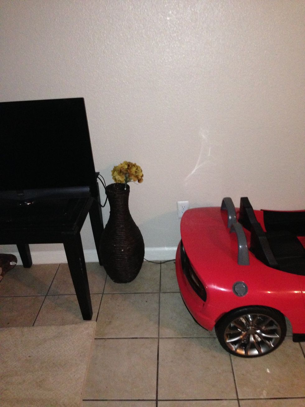 Wicker vase with gold flowers omg good clearance finds from target excuse my car\ud83d\ude14\ud83d\ude97that would be Max's we have no other options and he really wanted it so I grin it and bear it \ud83d\ude01\ud83d\ude18\ud83d\udc66