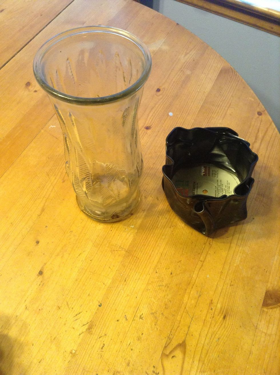 Wiggle the record off the vase.