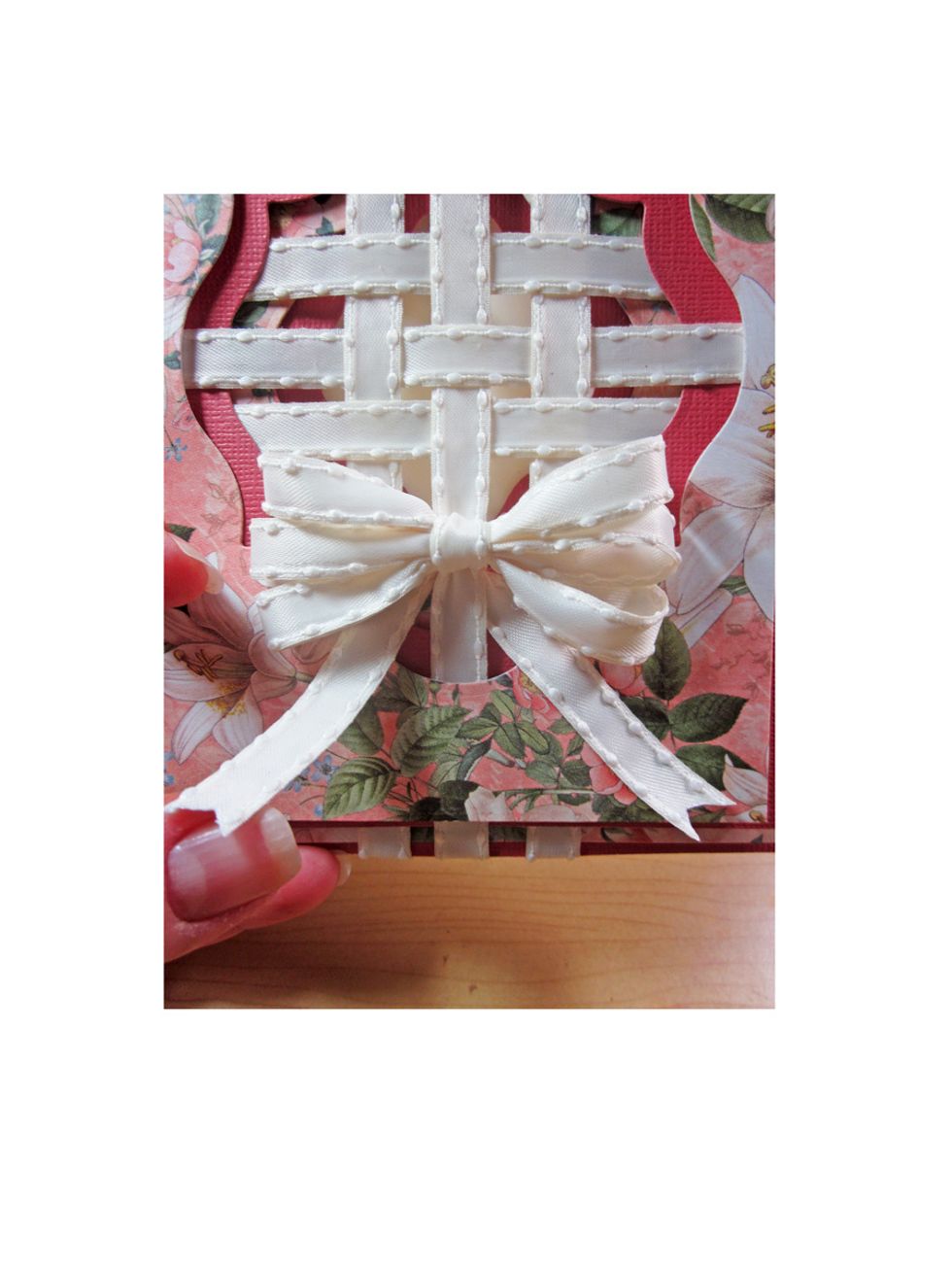 Wiggle your bow to the appropriate spot and cut your tails with a pretty end. Moving your bow down a bit will hide your knot from site from the inside of the card