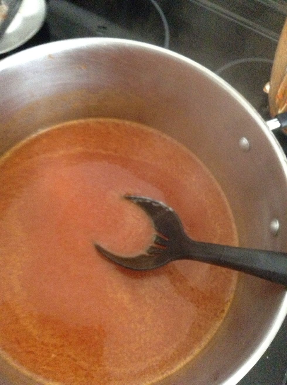 Will look like this...now add your flour mixture little at a time...stirring constantly with a slotted spoon to break any balls that is formed. Keep stirring and adding flour mixture.......