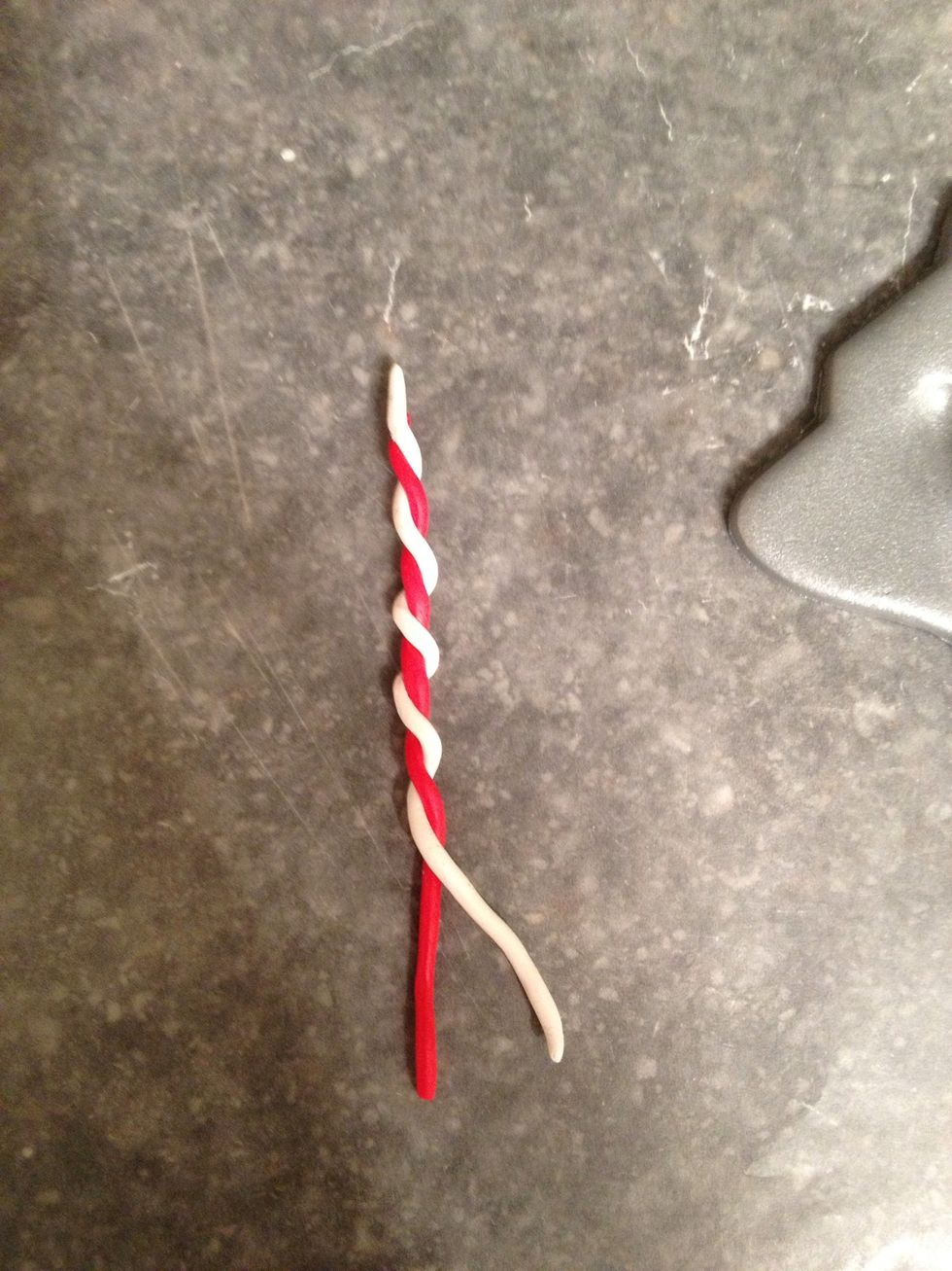 Wind the two colors around each other.