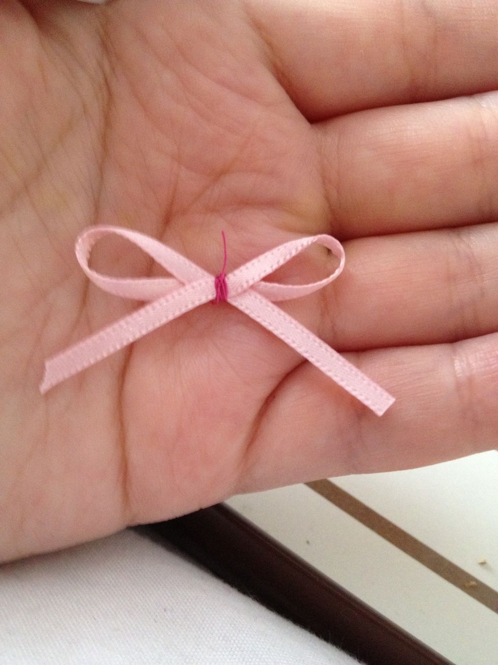 Wind thread round and tie off