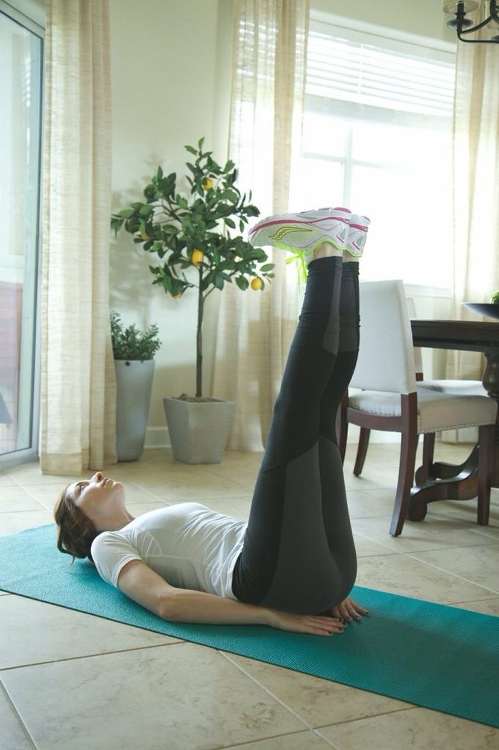Windshield Wipers Part I: Lay on your back with legs straight in the air. Be sure to keep the lower back on the ground the entire time.