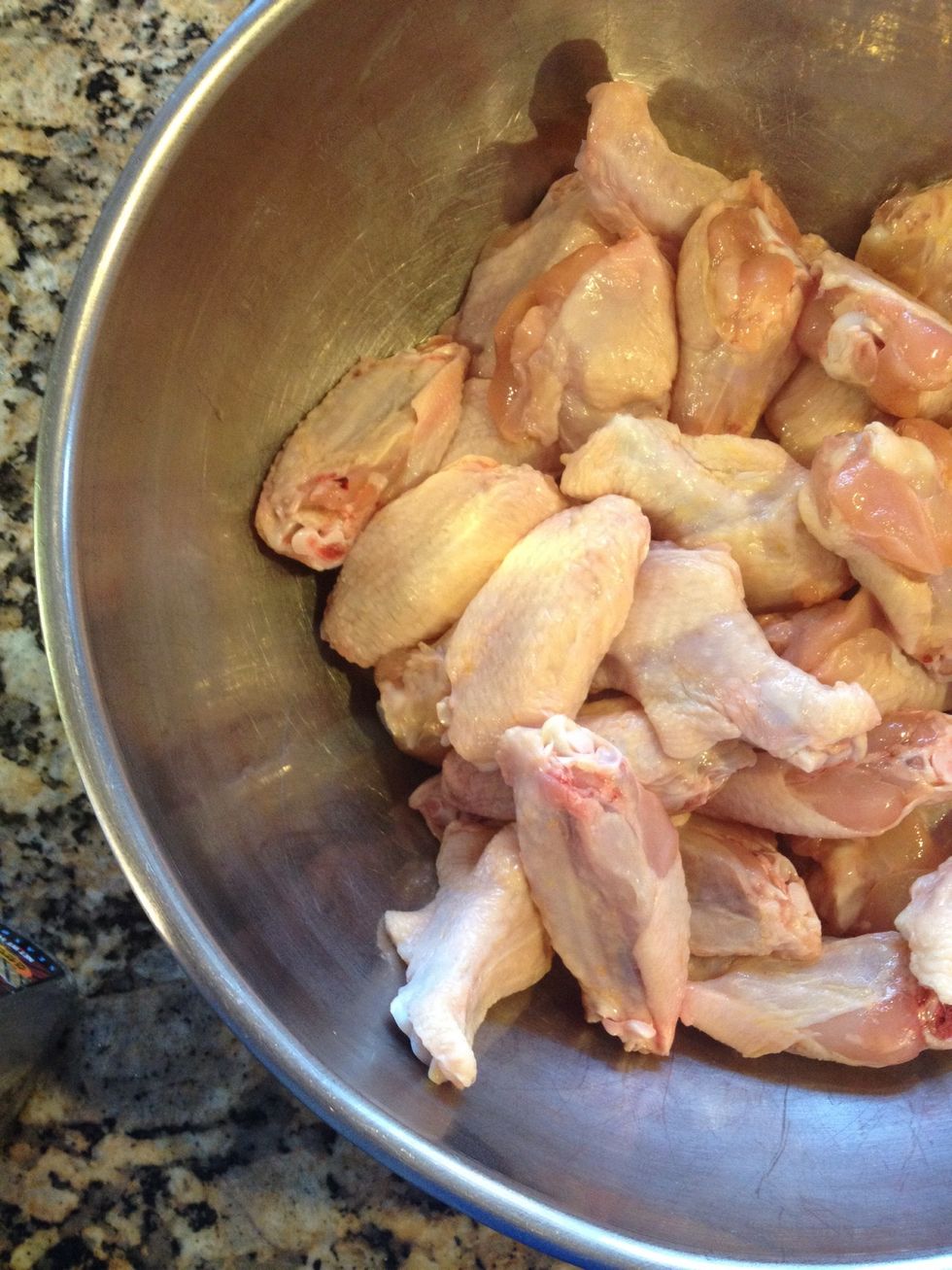 Wings..I season these in a large bowl with any seasoning you like. I use cayenne, black pepper, and original chicken seasoning