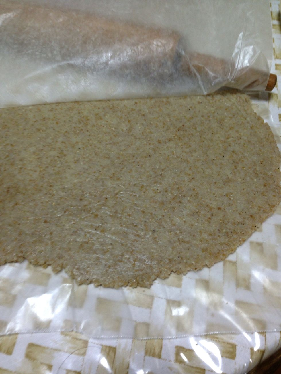 Wipe a tray base with olive oil then set kenne layer in alternate with filling then top one more kibbe layer to cover filling