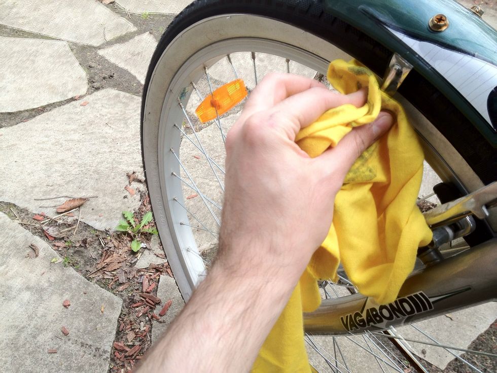 Wipe clean with rag. You may have to repeat the process on stubborn areas.