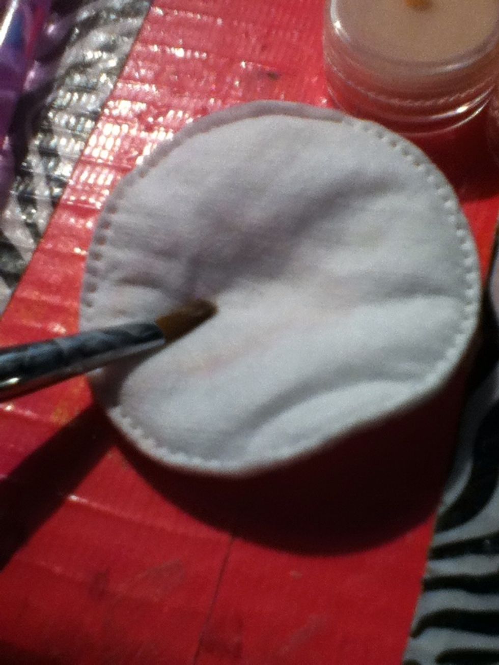 Wipe of brush after each color