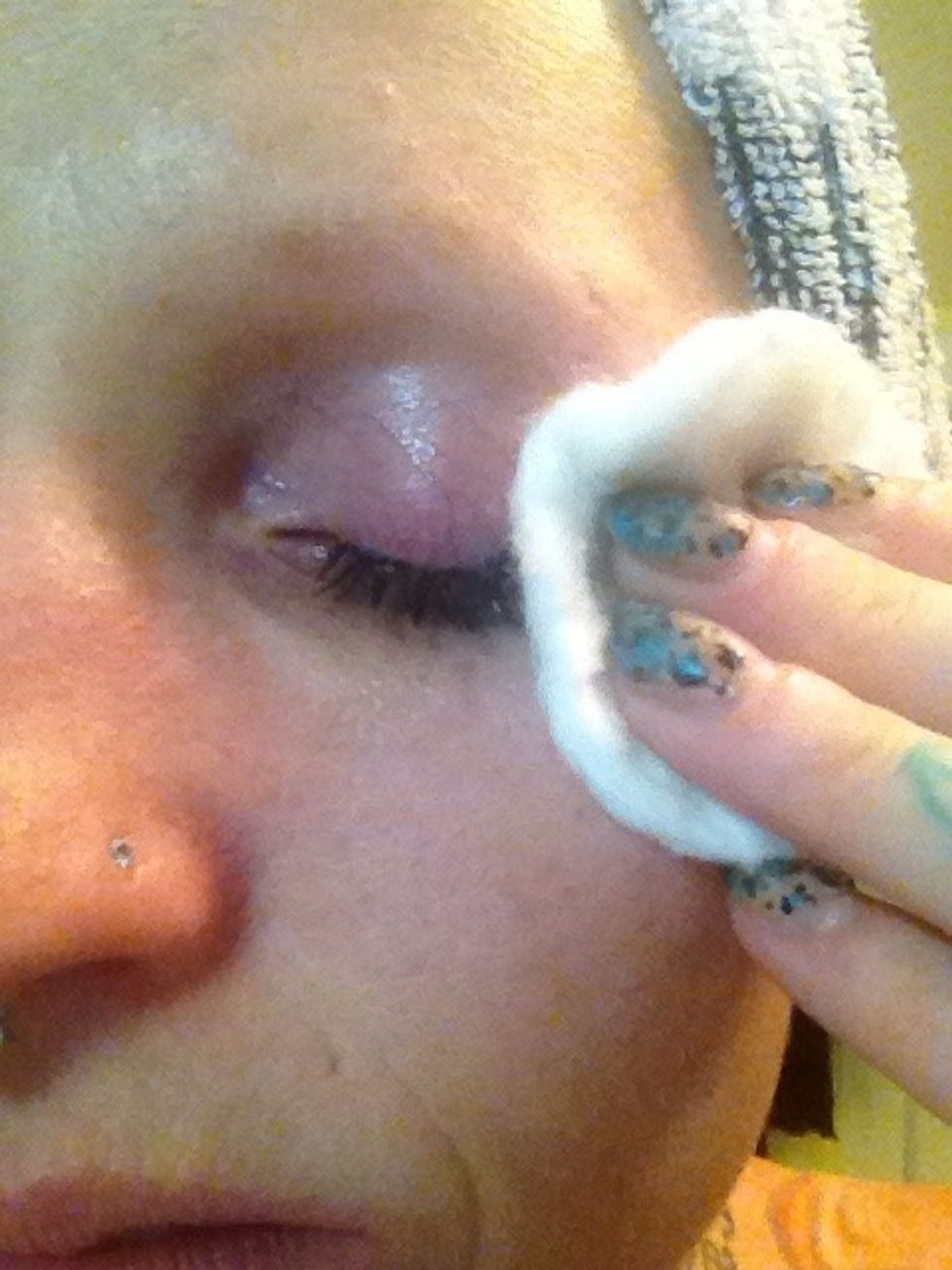 Wipe off eye makeup. If I am wearing waterproof makeup I will wait a few seconds before wiping off excess remover
