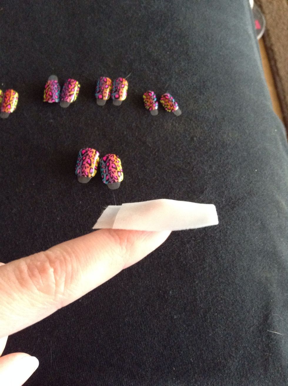 Wipe off your nails with the pad. This will take off any dirt or oil.