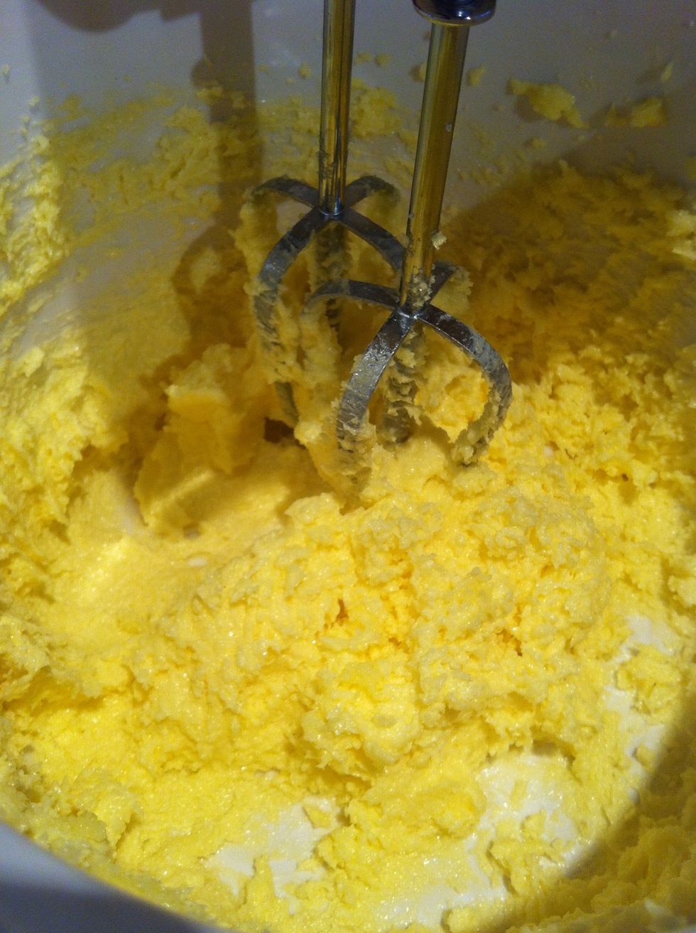 Wisk until the sugar and butter have combined, make sure that the mixture is light and fluffy and looks pale in color.