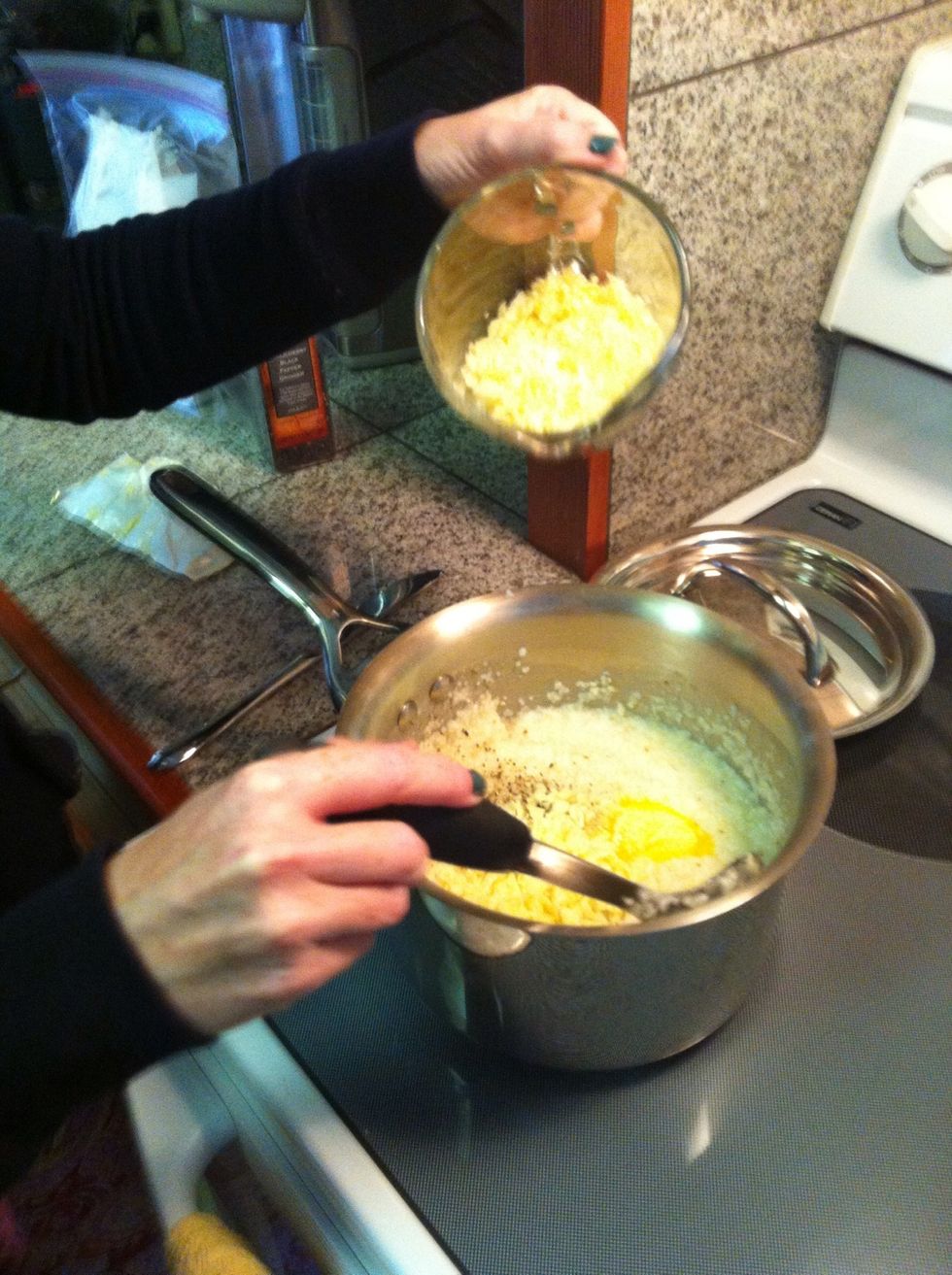 With 2-3 minutes left, add the grated cheese, remaining butter, and salt and pepper to taste. Keep in mind that grits require A LOT of salt, but it is better to add too little than too much.
