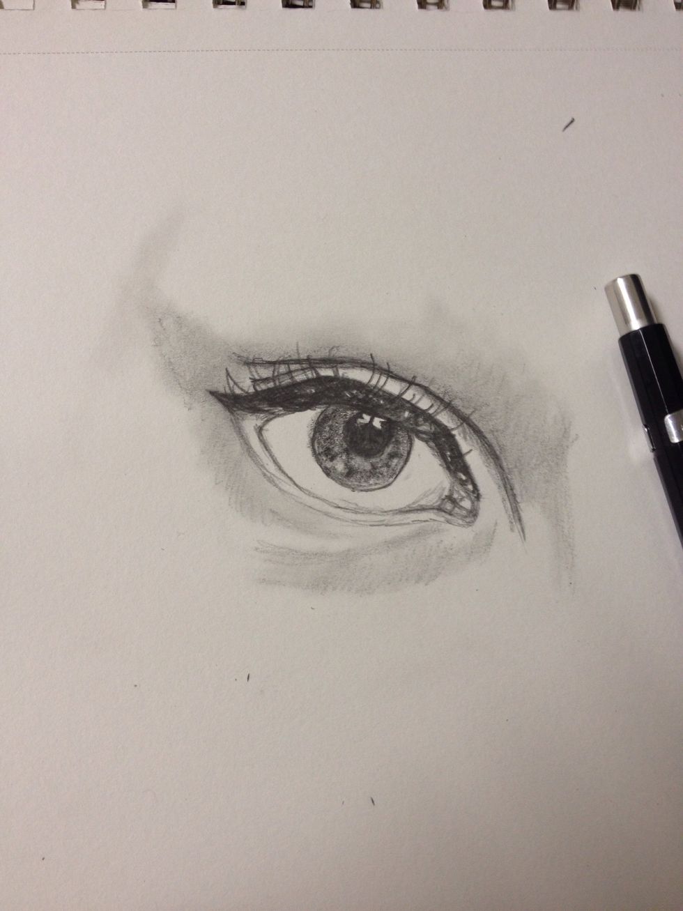 With a .5 lead pencil make lashes. Fast curved flicks that contour around the eye. NO STRAIGHT LINES.