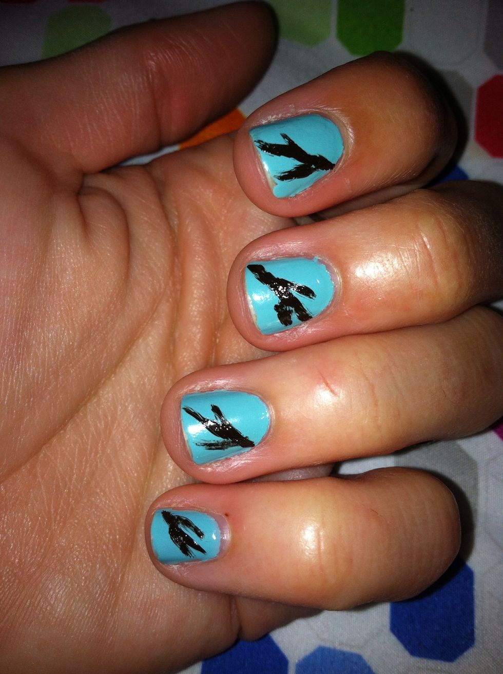With a brown nail polish paint branches on ur nails doesn't have to be perfect