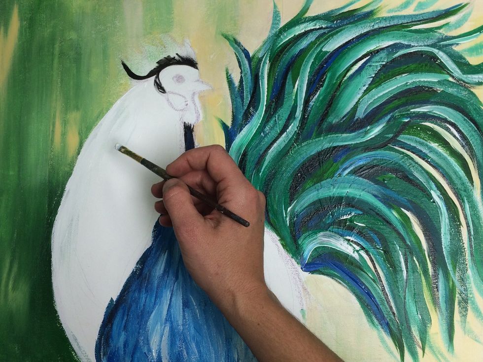 With a clean brush, paint white on the top of the neck to clean up the messy edge.