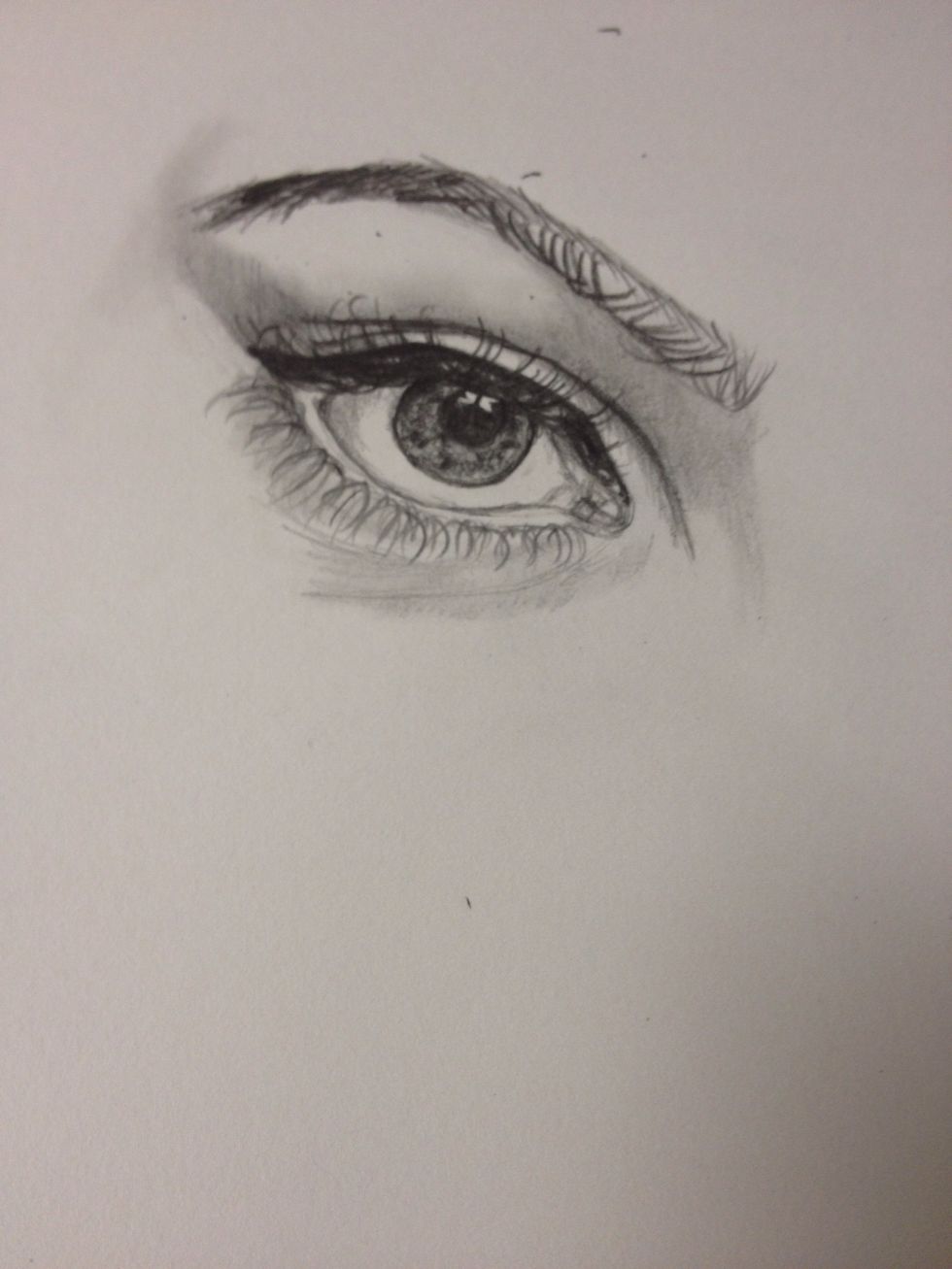 With a dark pencil start to fill the eyebrow. I ended up extending the length of the behind of the brow.