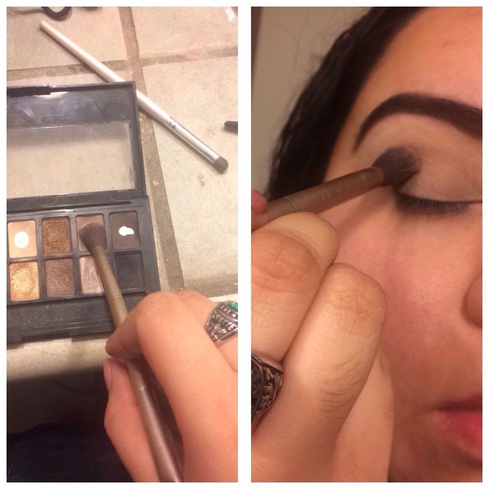 With a fluffy blending brush get a light brown or cool toned eyeshadow and apply it to your crease as your initial transition color.
