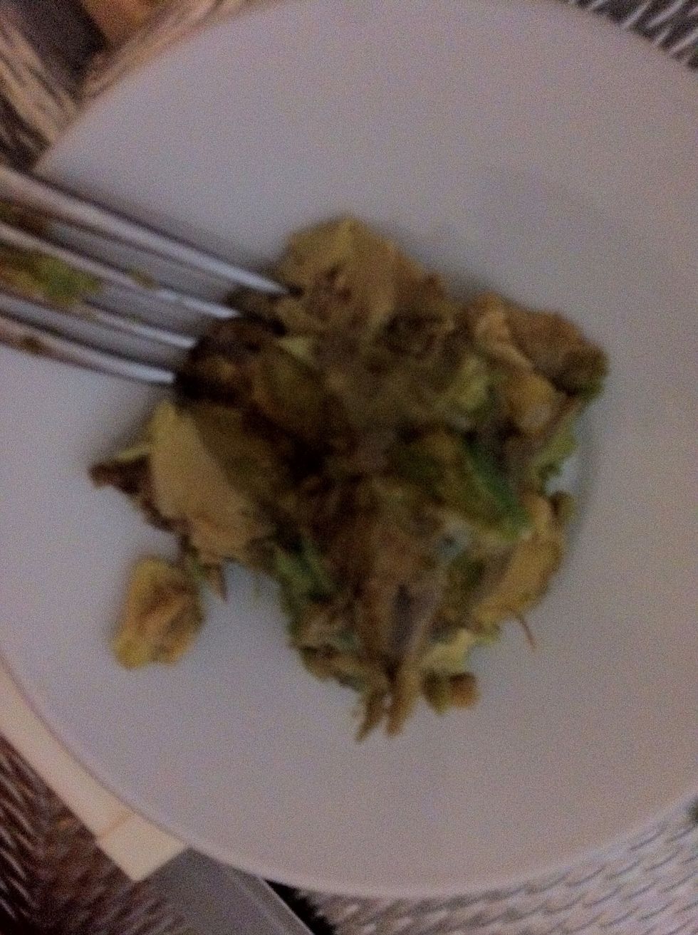 With a fork "smash" the avocado =)