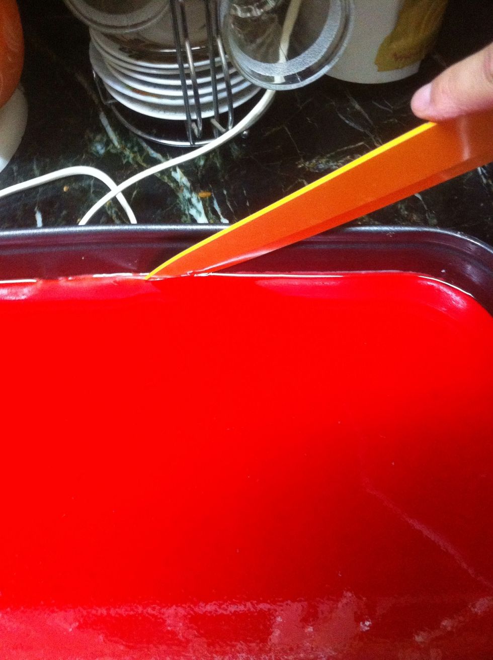 with a knife start peeling the jelly of the edges because it will be sticky and make hard to remove the edges