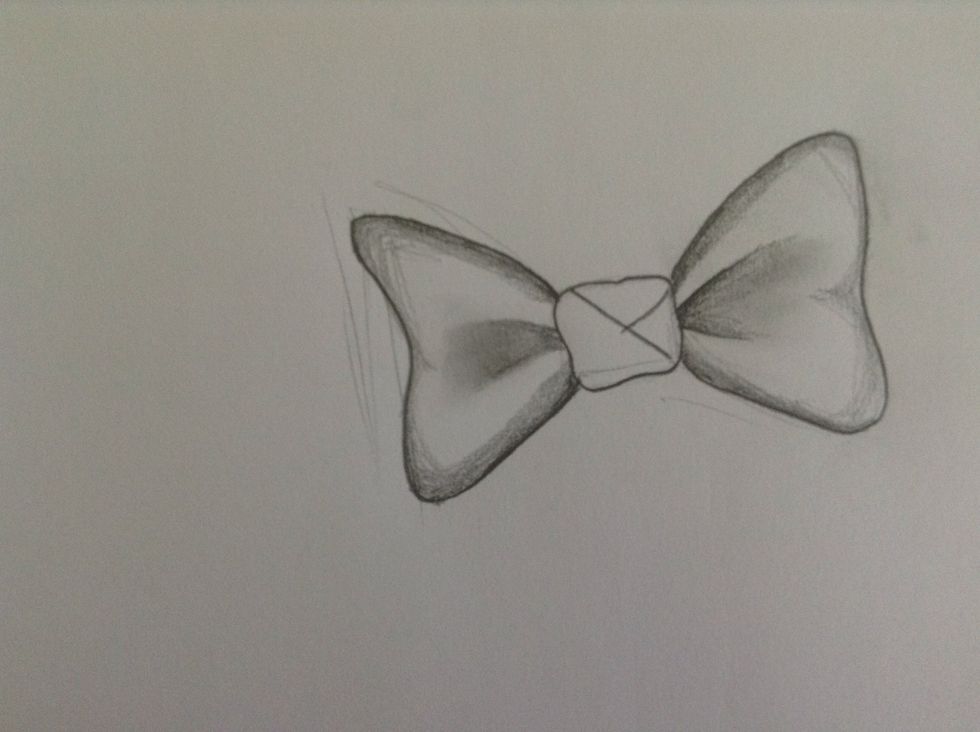 With a light hand. Give the "triangular" part if the bow a SLIGHT heart shape^^^